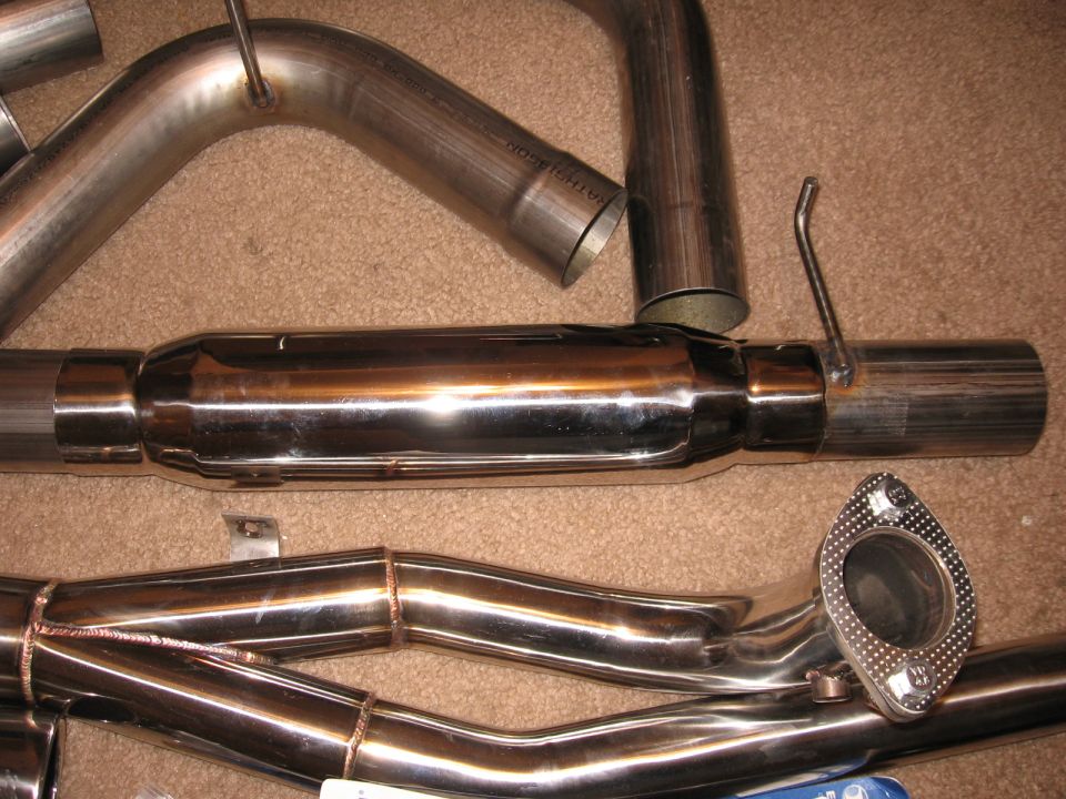 Chrome exhaust pipes and muffler section with a flange fitting