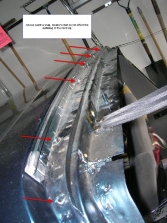 1995 Ford Bronco - Red arrows indicate snap locations for a vehicle's hardtop installation.