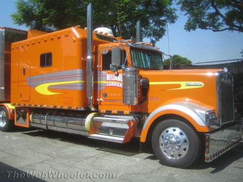1968 Ford Mustang - This Kenworth semi-truck displays 'Reliable Carrier' branding and the number 30148 on its side.
