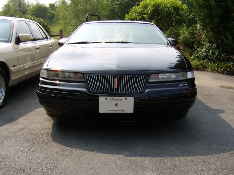 1996 Mercury Grand Marquis - I was toying between keeping the chrome grille, or blacking it out. So, I compromised and decided to monochrome the outer chrome ring but k…