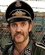 2001 Ford Crown Victoria - A man wearing a distinctive hat and uniform is pictured against a blurred background.