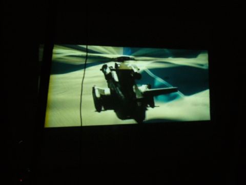 1991 Ford Probe - A helicopter is displayed on a screen, with a watermark for SUPERMOTORS.NET at the bottom.