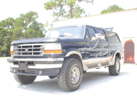 1993 Ford C-350 (Centurion Conversions) - Ford F-350 Centurion Conversion Van, likely a 1992 model year, parked outdoors.