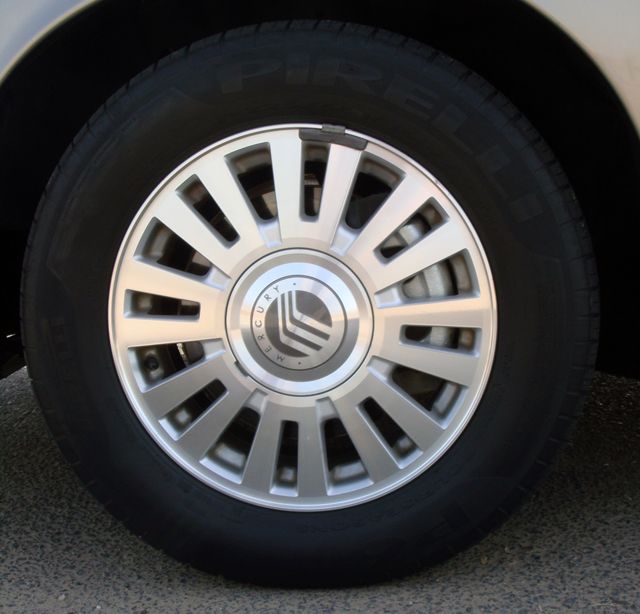 Close-up of a Mercury wheel with a logo