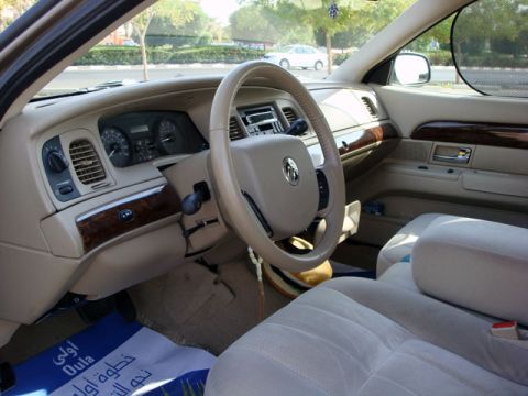 2007 Mercury Grand Marquis - Interior view of a 2007 Mercury Grand Marquis, the dashboard and seating area.