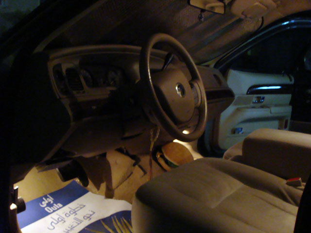Interior shot of a 2007 Mercury Grand Marquis, showing the steering wheel, dashboard, and seats