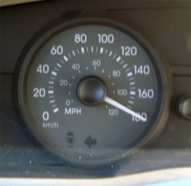 Speedometer gauge showing 100 mph, with a 2007 Mercury Grand Marquis badge visible