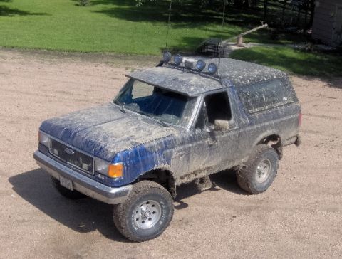 1987 Ford Bronco - This 1987 Ford Bronco is covered in mud after an off-road excursion.