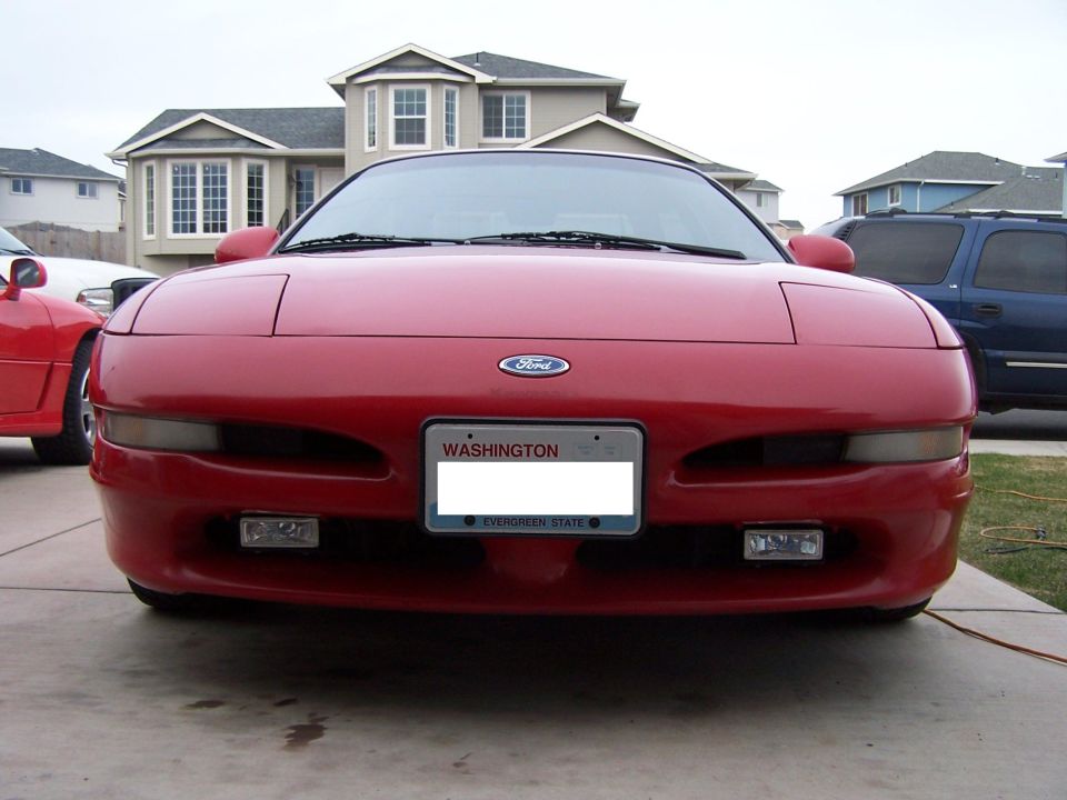 Red 1994 Ford Probe front view with Washington license plate