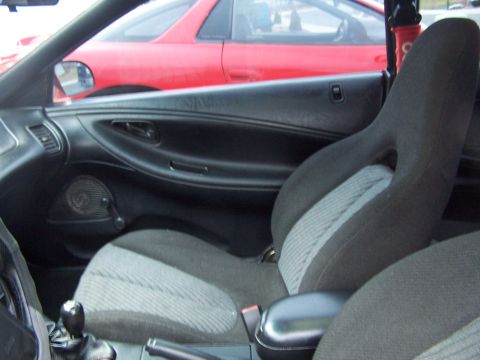 1994 Ford Probe - Interior of a 1994 Ford Probe, with another vehicle seen through the side window.