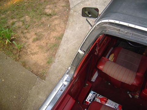 1986 Ford Bronco - Aluminum flat stock from Lows was used to connect the Kayline/STC snap rails to the Bronco using the factory hard top fastiners. No holes w…