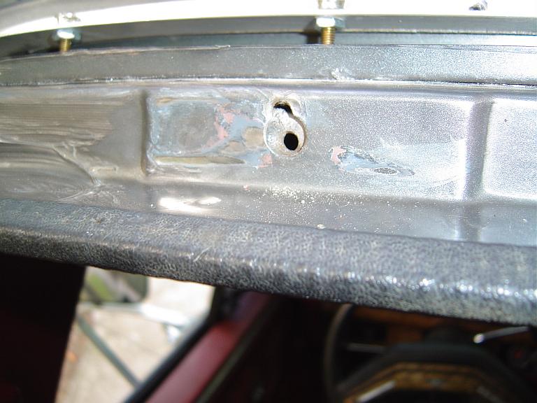 These holes are striped and must be repaired before attaching/making the rail to hard top mount brackets.