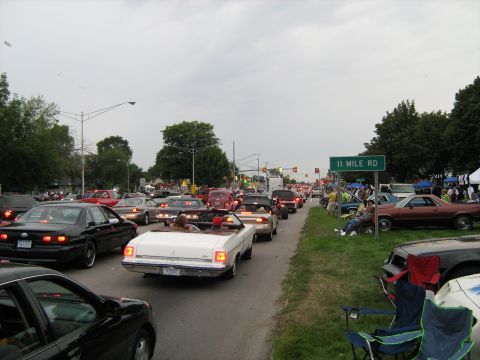1988 Mercury Grand Marquis - A white convertible with a red interior is seen in a traffic jam on 11 Mile Road during the Woodward Cruise 2007.
