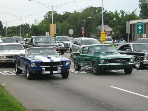 1988 Mercury Grand Marquis - A green 1967 Ford Mustang fastback is seen in traffic during the Woodward Cruise 2007.