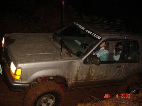 1989 Ford Bronco - Anne climbing a gloppy hill