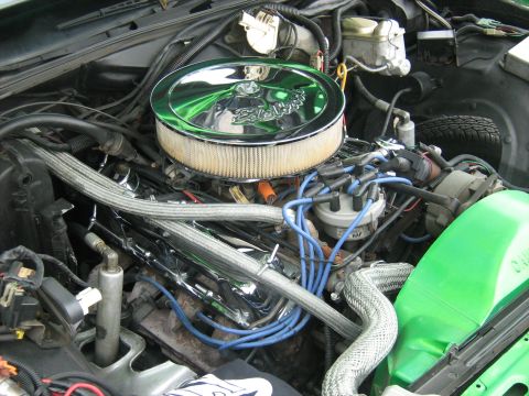 1988 Mercury Grand Marquis - Close-up view of a V8 engine, an aftermarket air filter and colorful wiring.