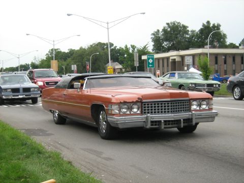 1988 Mercury Grand Marquis - This orange convertible, likely a 1974 model, is seen in traffic during the Woodward Cruise 2007.
