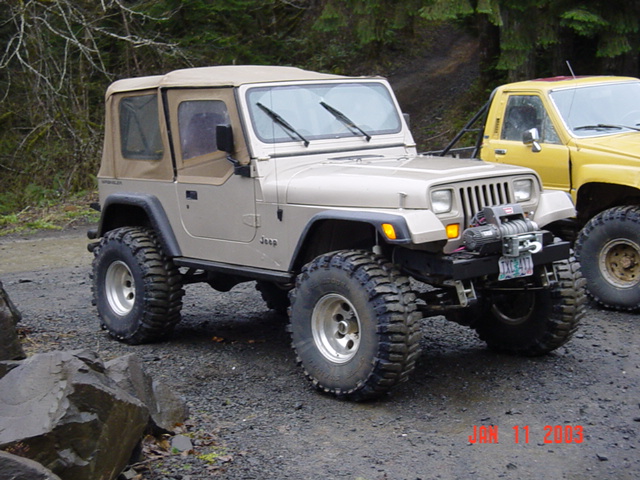 YJ with springover, 2 1/2" springs and 37" Boggers