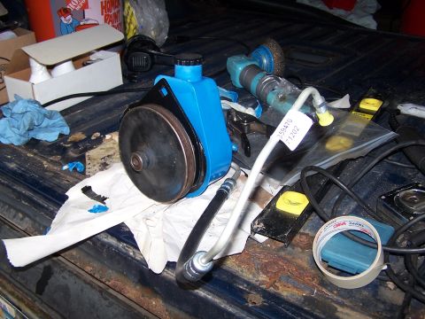 1986 Ford Bronco - Assembled bracket and high pressure hose