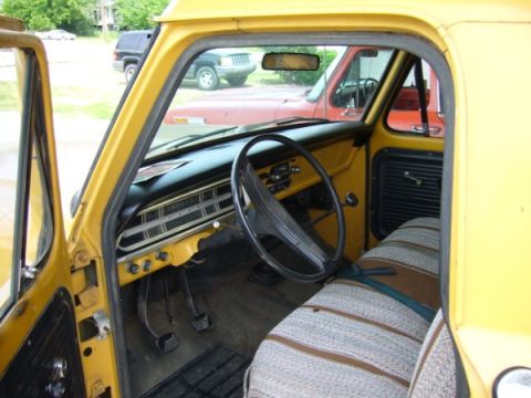 1971 Ford F-250 - view from the driver's door, check out that perfect dash cap, original AM radio, and 4-speed floorshift!