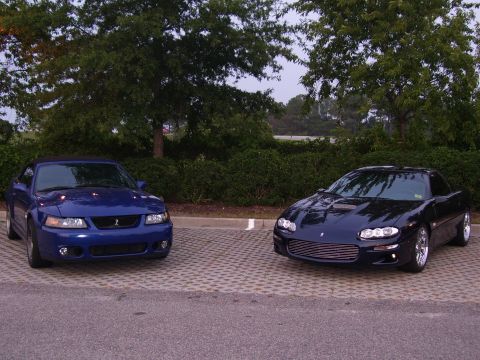 2003 Ford Mustang - He was pretty upset when my 'stock' cobra (just a cat back) beat him pretty badly :-)
