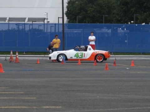 2001 Mercury Grand Marquis - A race car with number 431 is positioned on a track surrounded by orange cones.