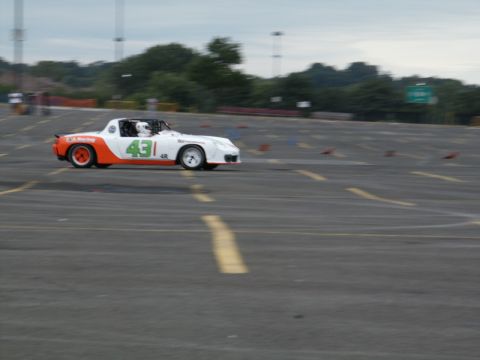 2001 Mercury Grand Marquis - A race car with the number 431 is seen on a track during an event.