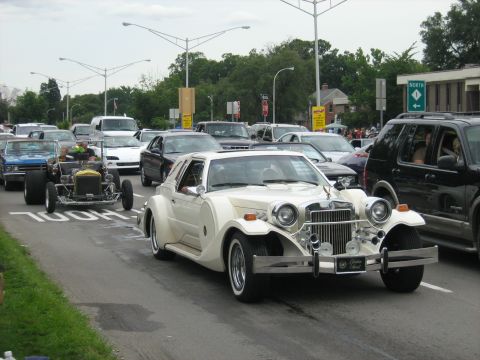1988 Mercury Grand Marquis - A custom-built car with a retro design is seen in a line of traffic.
