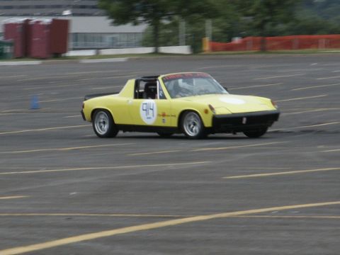 2001 Mercury Grand Marquis - Porsche 914 on a race track, possibly during an autocross event.