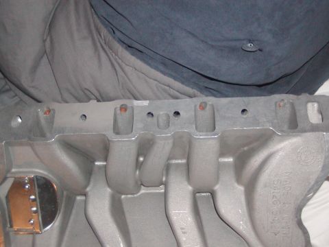 1991 Ford Bronco - This is a close-up view of an aluminum intake manifold, likely a replacement part.