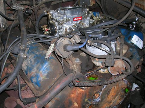 1978 Ford F-250 - The engine bay shows a V8 engine with a prominent Edelbrock carburetor and distributor cap.