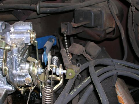 1978 Ford F-250 - Engine bay view showing carburetor linkage, spark plug wires, and other engine components.