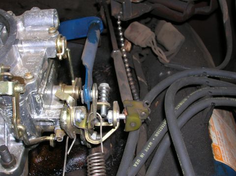 1978 Ford F-250 - Detail of engine components, including carburetor linkage and spark plug wires, with visible "Made in USA" text.