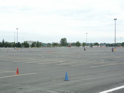 2001 Mercury Grand Marquis - An empty parking lot is marked with cones, suggesting a planned event or course.