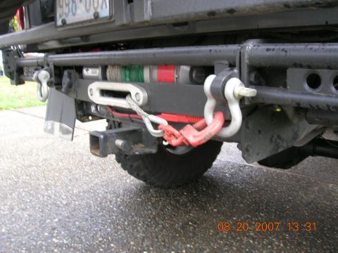 1996 Ford Bronco - Aftermarket rear bumper assembly with winch and recovery gear.
