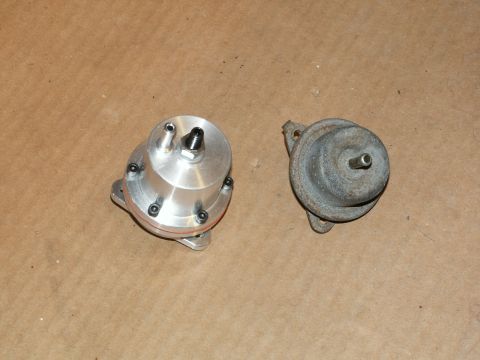 1990 Ford Mustang - Comparison of a new aluminum fuel pressure regulator next to an old, corroded one.