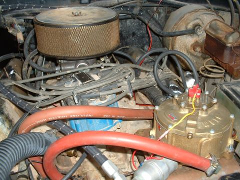 1978 Ford Bronco - Close-up view of an engine bay, showing various components and wiring.