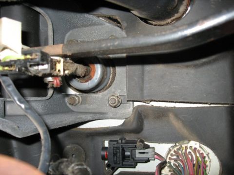 1989 Ford F-250 - 4 nuts for the booster, and brake light switch have to come out.