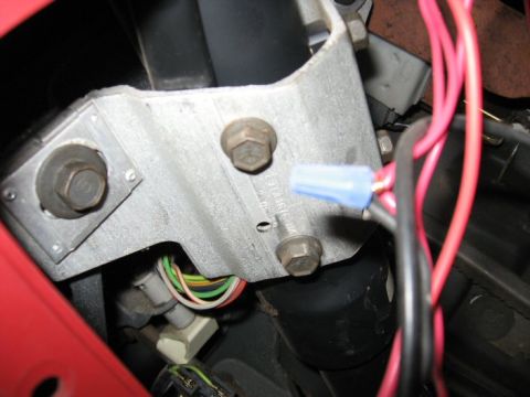 1989 Ford F-250 - Gotta drop the column. Two bigger bolts, one on each side, in the square plate.