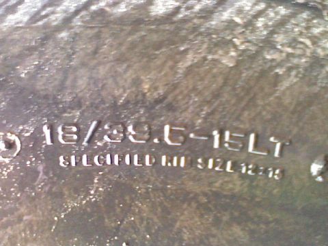 1991 Chevrolet Suburban - The image shows detailed markings on a tire's sidewall, including size specifications.