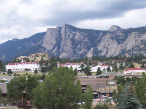 1972 Ford Ranchero - A scenic view of mountains overlooking a town with distinct architecture.
