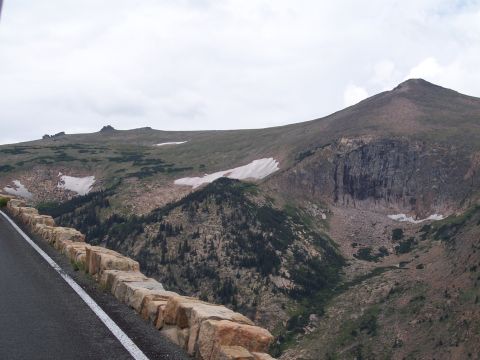 1972 Ford Ranchero - Mountain scenery with a road and a stone retaining wall.