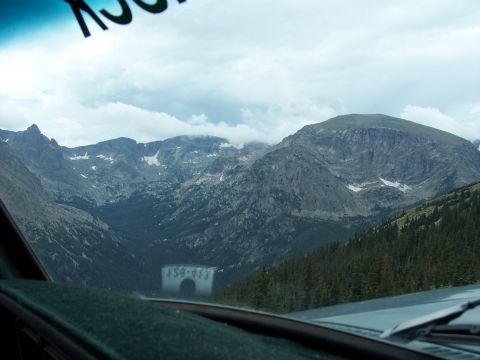 1972 Ford Ranchero - View of a mountain range from inside a vehicle, with clouds obscuring the peaks.