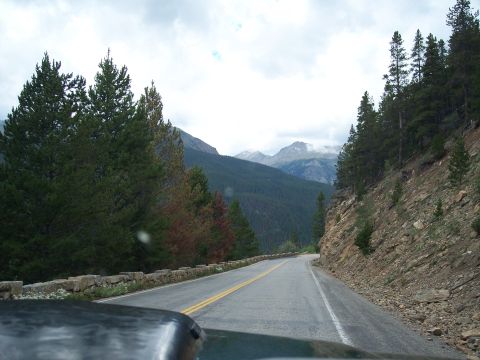 1972 Ford Ranchero - Driving on a scenic mountain road with dense pine forests and rocky terrain.