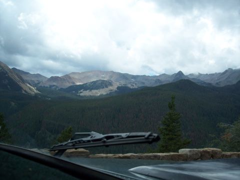 1972 Ford Ranchero - A scenic mountain vista seen through the windshield wipers of a vehicle.