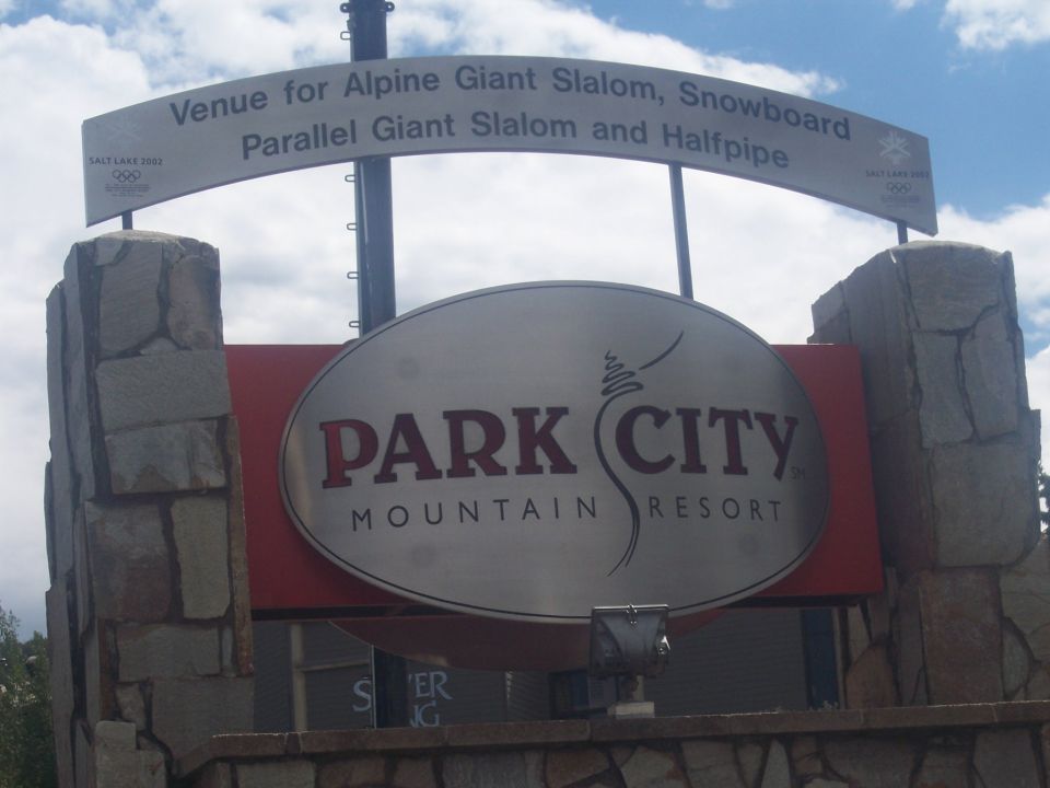 Park City Mountain Resort entrance sign with 2002 Olympics banner
