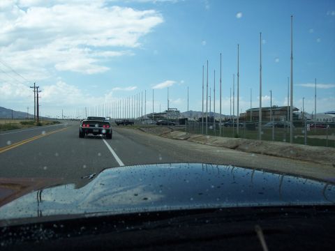 1972 Ford Ranchero - Driving behind a 1972 Ford Ranchero on a highway with a line of poles along the side.