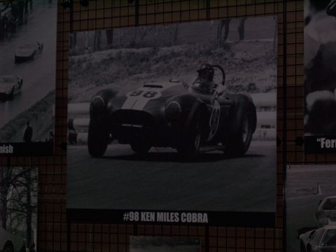 1972 Ford Ranchero - A vintage race car, identified as a Ken Miles Cobra, is displayed on a wall.