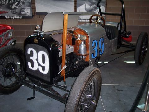 1972 Ford Ranchero - A vintage race car, possibly from the early 20th century, is displayed indoors with the number 39 prominently featured.