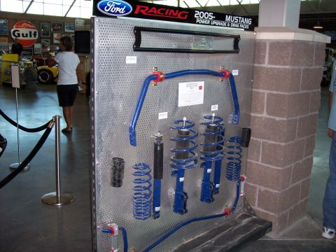 1972 Ford Ranchero - A display of performance parts for a 2005 Ford Mustang is shown, suspension components.